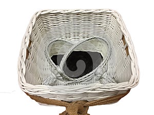 White woven basket and oval mirrors