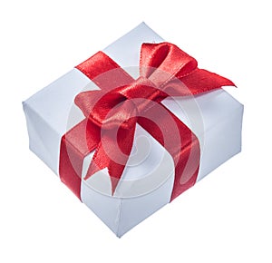 White wrapped gift box with red knot isolated on white