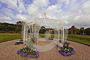 White wrought iron gazibo.