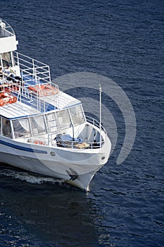 White yacht big boat nose closeup in the sea waves