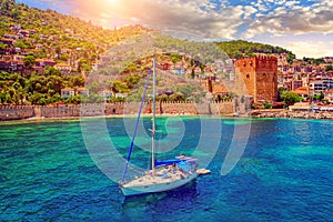 White yacht in the sea bay. Harbor of the Red Tower Alanya, Turkey