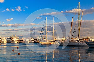 White yachts in sea harbor of Hurghada, Egypt. Port with tourist boats on the Red Sea