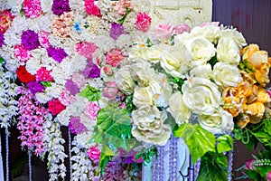 White yellow artificial plastic flowers wedding