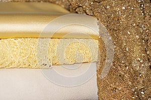 White yellow and gold wedding woman dress fabric detail