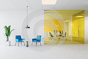 White and yellow open space office with lounge