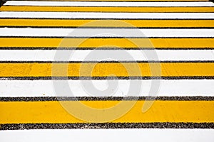 White with yellow roadway stripes