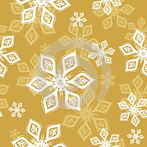 White and yellow Snowflake seamless pattern on golden background