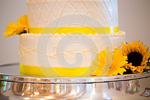 White and Yellow Wedding Reception Cake