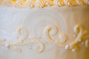 White and Yellow Wedding Reception Cake