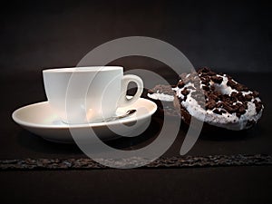 Whitecup blackbackground aroma coffee tea donuts photo