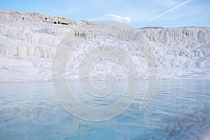 Whiteness of Pamukkale travertine favorite places with tourists