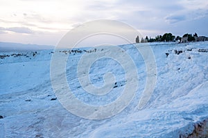 Whiteness of Pamukkale travertine favorite places with tourists