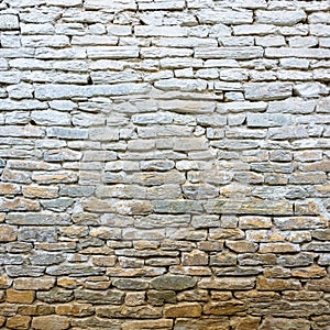 Whitewash old stone wall photo