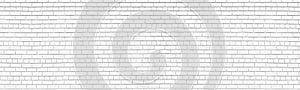 Whitewashed old brick wall wide texture. Shabby white painted exterior masonry. Abstract light grey vintage large background