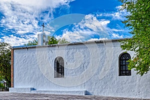 Whitewashed traditional church or hermita in a small village in Spain photo