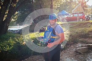 Whitewater kayaker paddling on river