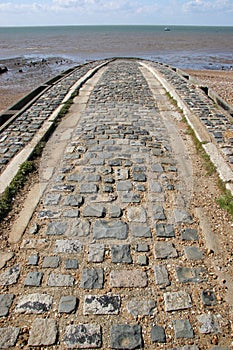 Whitstable Kent. Cobbled slipway leading to the sea.