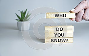 Who Do You Know text on wooden cubes, business concept. photo