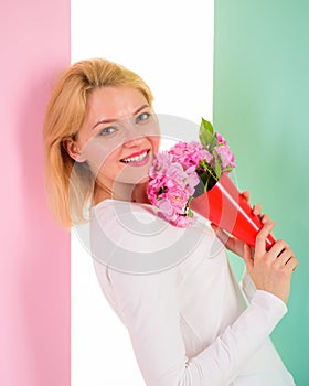 Who is her secret admirer Lady happy received flowers from secret admirer. Woman smiling dreamy try guess who fall in