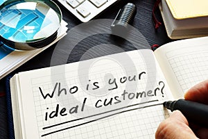 Who is your ideal customer handwritten in a note. Loyalty and satisfaction. photo
