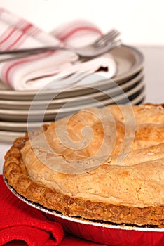 Whole apple pie with a flaky crust photo