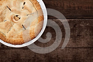 Whole Apple Pie Over Wooden Table Top