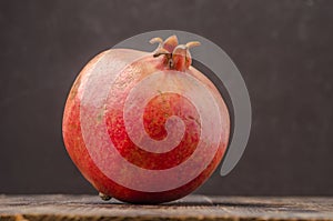 Whole big red pomegranate fruit