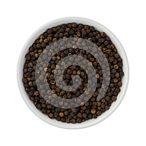 Whole Black Pepper in a Ceramic Bowl