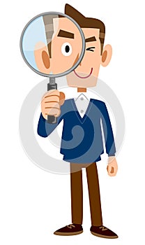 The whole body of a man looking through a magnifying glass