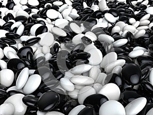 Whole bunch of small black and white small rocks and stones