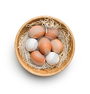 Whole chicken eggs in basket. Top view