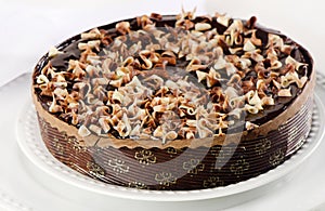 Whole Chocolate cake on white plate