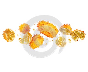 Whole and chopped ripe Kiwano melon Cucumis metuliferus in the air on white background