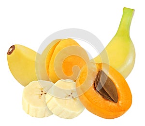 Whole and cut banana and apricot fruits isolated on white with clipping path