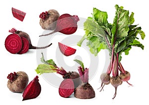 Whole and cut boiled red beets on white