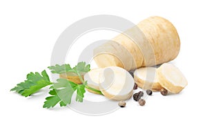 Whole and cut raw parsley root, fresh herb isolated on white