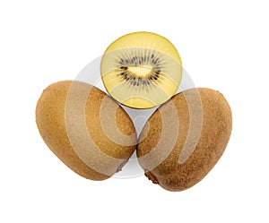 Whole and cut ripe yellow kiwis on white, top view