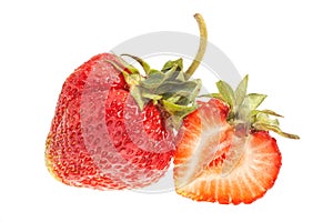 Whole and cut strawberry