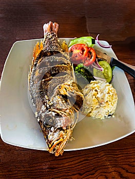 Whole Fish Cooked and served at Seafood Fine Dining