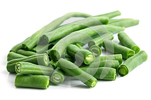 Whole French green string beans cut and isolated on white.