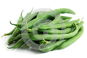 Whole French green string beans isolated on white.