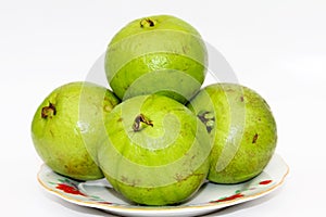 Whole fresh guava fruit on white background
