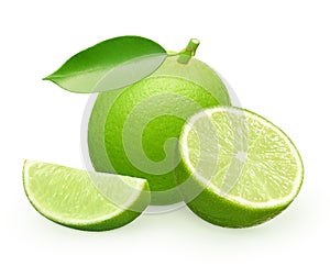 Whole fresh lime fruit with green leaf, half and slice