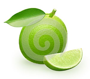 Whole fresh lime fruit with green leaf and slice