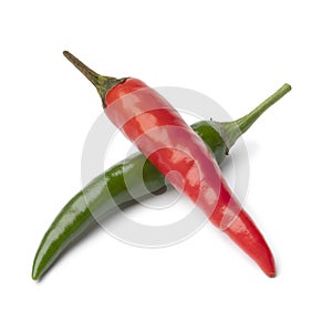 Whole fresh raw green and red rawit pepper close up on white background