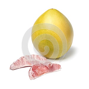 Whole fresh red Pomelo and peeled pomelo slices close up on white background