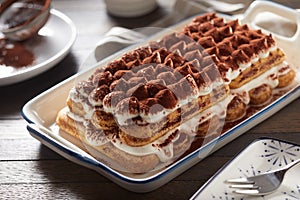 Whole freshly made Italian tiramisu dessert