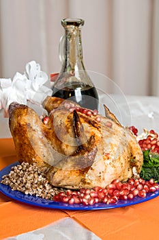 Whole fried chicken with buckwheat and pomegranate