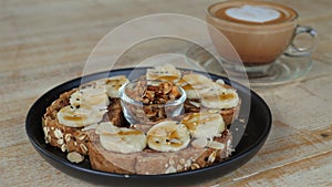 Whole grain bread topped with banana