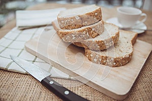 Whole grain wheat bread top view rustic on wooden table